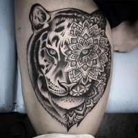 New school style black ink thigh tattoo of tiger stylized with flowers
