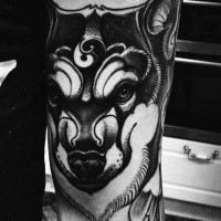 New school style black ink wolf tattoo on forearm