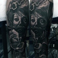 New school style black ink woman in gas mask tattoo on forearm combined with rose flower