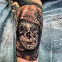 New school style colored arm tattoo of demonic skull with big bug