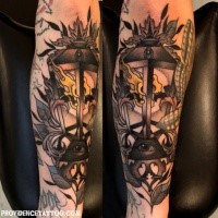 New school style colored arm tattoo of old lighter with pyramid and eye