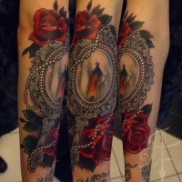 New school style colored arm tattoo of vintage mirror with roses