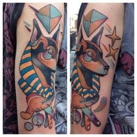 New school style colored arm tattoo of Egypt God Anubis with stars