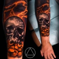 New school style colored arm tattoo of fantasy human skull with golden coins