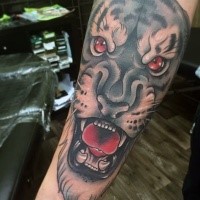 New school style colored dark tiger tattoo on forearm