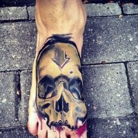 New school style colored foot tattoo of human skull with arrow