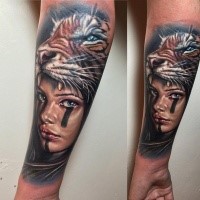 New school style colored forearm tattoo fo woman with tiger skin helmet