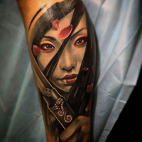 New school style colored forearm tattoo of beautiful geisha with sword