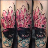 New school style colored forearm tattoo of woman eye with crystals