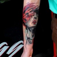 New school style colored forearm tattoo of woman with jewelry