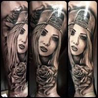 New school style colored forearm tattoo of girl with rose