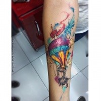 New school style colored forearm tattoo of balloon with stars