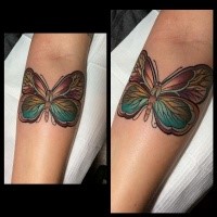 New school style colored forearm tattoo of fantasy butterfly