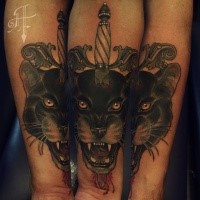 New school style colored forearm tattoo of black panther with dagger