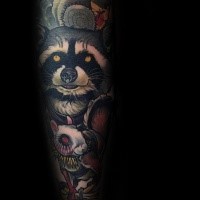 New school style colored hand tattoo of raccoon with with mouse