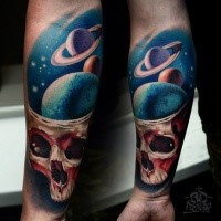 New school style colored hand tattoo of human skull stylized with planets