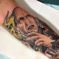 New school style colored Harry Potter movie villain tattoo on forearm