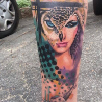 New school style colored leg tattoo of woman face with owl