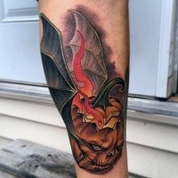 New school style colored leg tattoo of pumpkin with bat wings