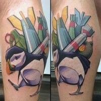 New school style colored leg tattoo of bird with bombs
