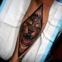 New school style colored leg tattoo of demonic lion face with black triangle