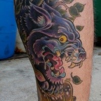 New school style colored leg tattoo of evil dog with leaves and deer