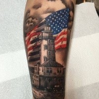New school style colored leg tattoo of big lighthouse and flag