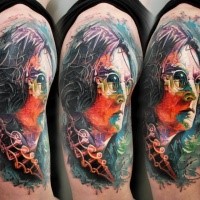 New school style colored Lennon portrait tattoo on shoulder