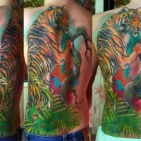 New school style colored natural looking tiger tattoo on back with tree and plants