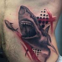 New school style colored shark chasing fish tattoo on side