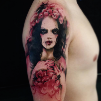New school style colored shoulder tattoo of woman with flowers