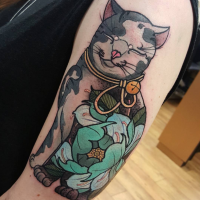 New school style colored shoulder tattoo of big cat with blue flower