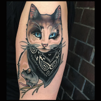 New school style colored shoulder tattoo of cat with little mouse