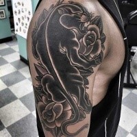 New school style colored shoulder tattoo of black panther and roses