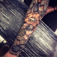 New school style colored sleeve tattoo of caracal in bush