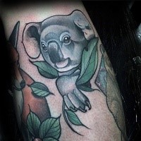 New school style colored tattoo of beautiful koala bear and leaves