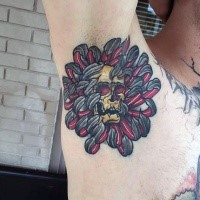 New school style colored tattoo of flower with human skull