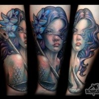 New school style colored tattoo of mermaid with flowers