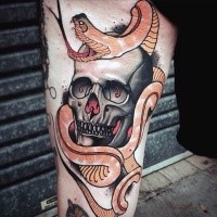New school style colored thigh tattoo of human skull and snake