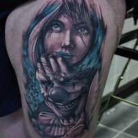 New school style colored thigh tattoo of woman with clown maniac