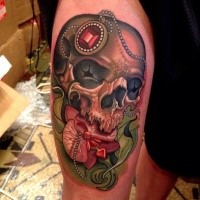 New school style colored thigh tattoo of human skull with jewelry
