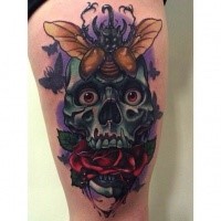 New school style colored thigh tattoo of big skull with bug and rose
