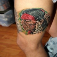 New school style colored thigh tattoo of old Indian