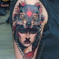 New school style colored witch portrait tattoo on shoulder with demonic wolf helmet