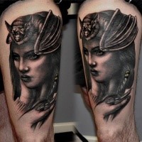 New school style colored woman portrait with with bat tattoo on thigh