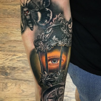 New school style very detailed forearm tattoo of old lighter with eye and butterfly