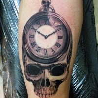 Nice black ink detailed skull with clock tattoo on leg
