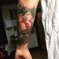 Nice colored detailed forearm tattoo of many dollar rolls