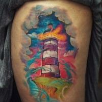 Nice colored ig lighthouse tattoo with waves