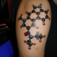 Nice colored shoulder chemistry themed tattoo